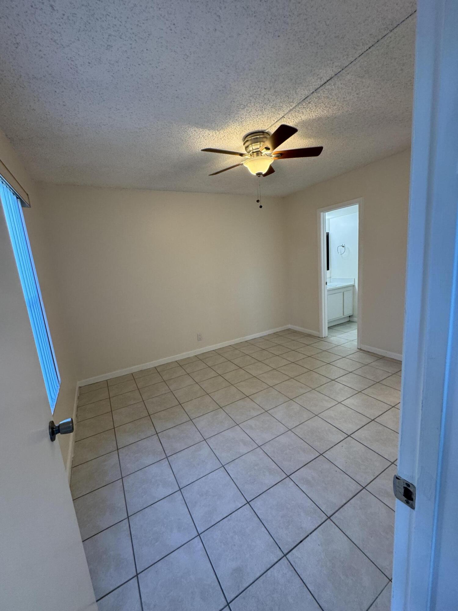 21890 Lake Forest Circle, Unit 102 Boca Raton, FL 33433 - Photo 10 of 24 en view of an empty room
