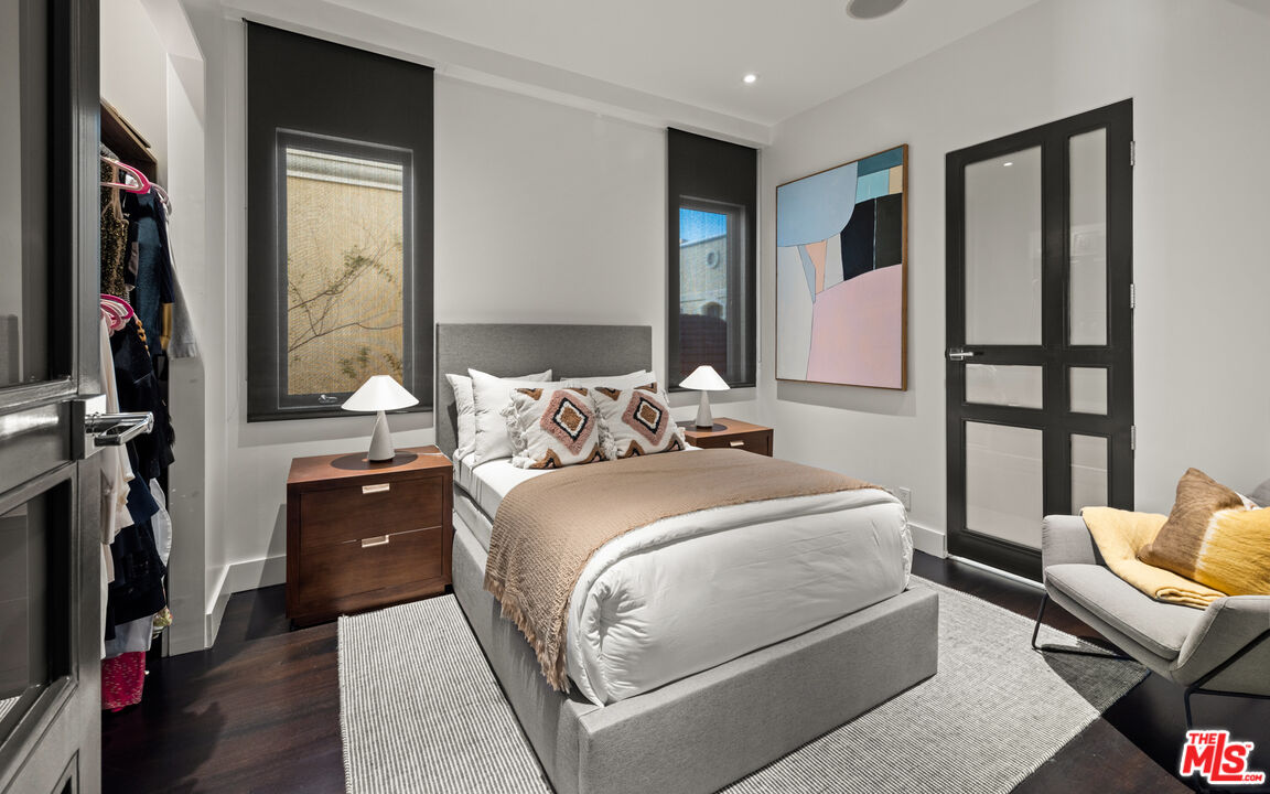 145 Channel Pointe Mall Marina del Rey, CA 90292 - Photo 36 of 75 a bedroom with a bed couch and a window