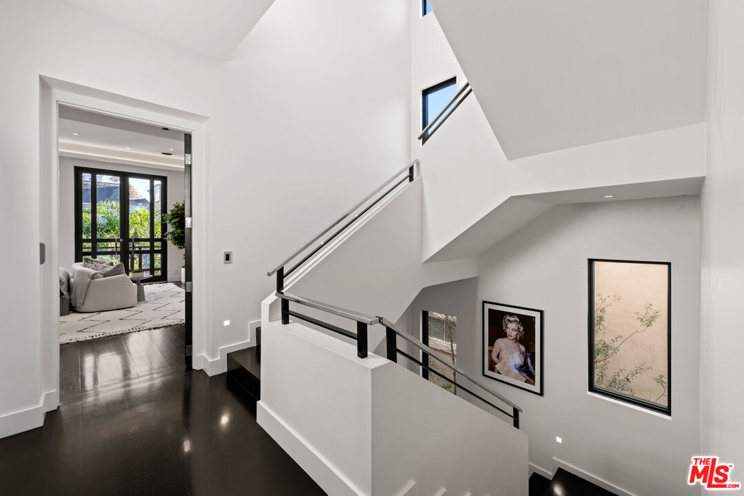145 Channel Pointe Mall Marina del Rey, CA 90292 - Photo 43 of 75 a living room with furniture and a stairs