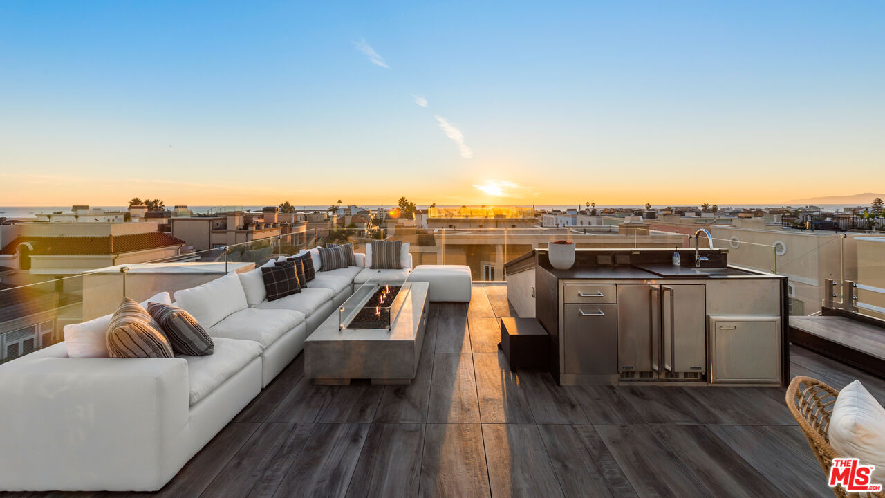 145 Channel Pointe Mall Marina del Rey, CA 90292 - Photo 56 of 75 a view of roof deck with seating space and hardwood floor