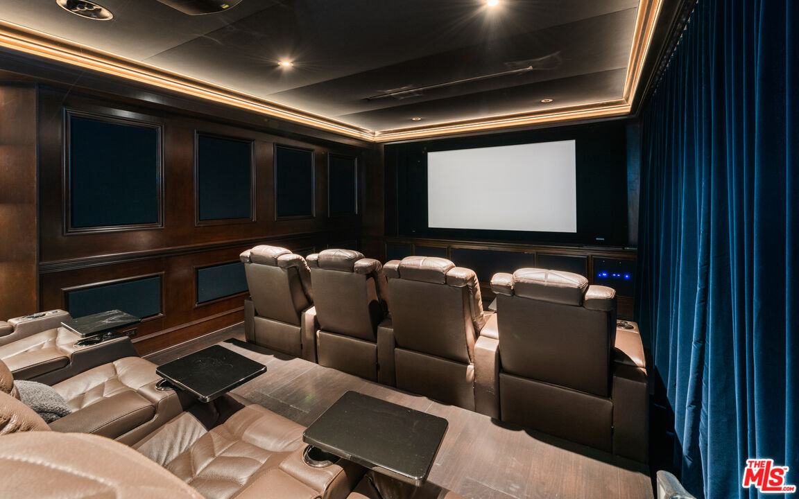 145 Channel Pointe Mall Marina del Rey, CA 90292 - Photo 66 of 75 a media room with lots of chairs and a projector screen