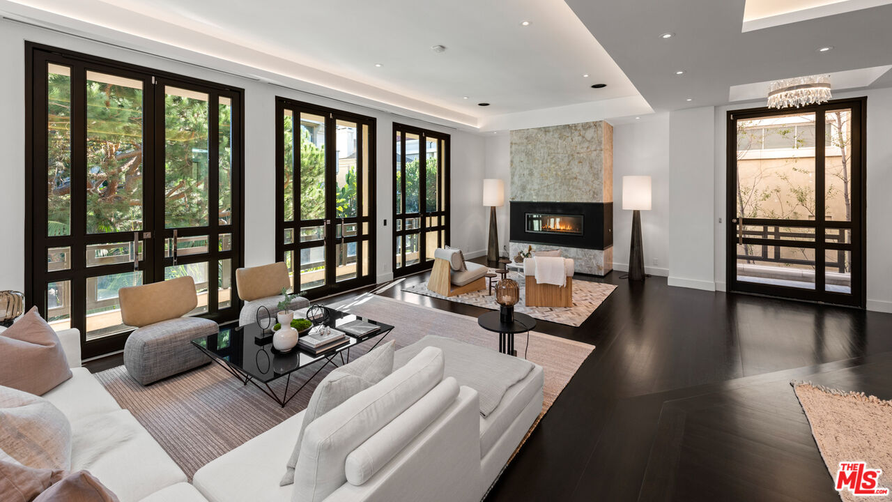 145 Channel Pointe Mall Marina del Rey, CA 90292 - Photo 7 of 75 a living room with furniture and floor to ceiling windows