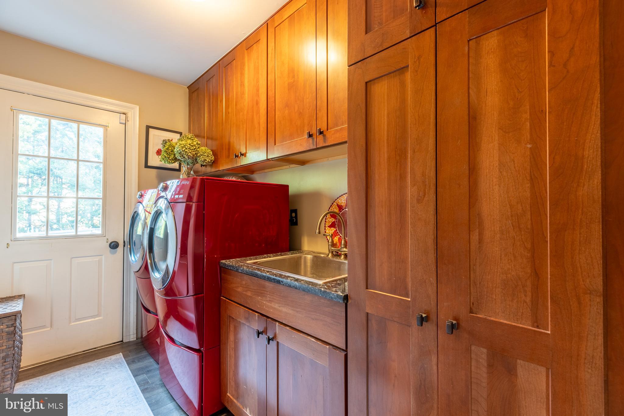 3 Heatherstone Way Hockessin, DE 19707 - Photo 11 of 29 a view of walk in closet with clothes and shoes