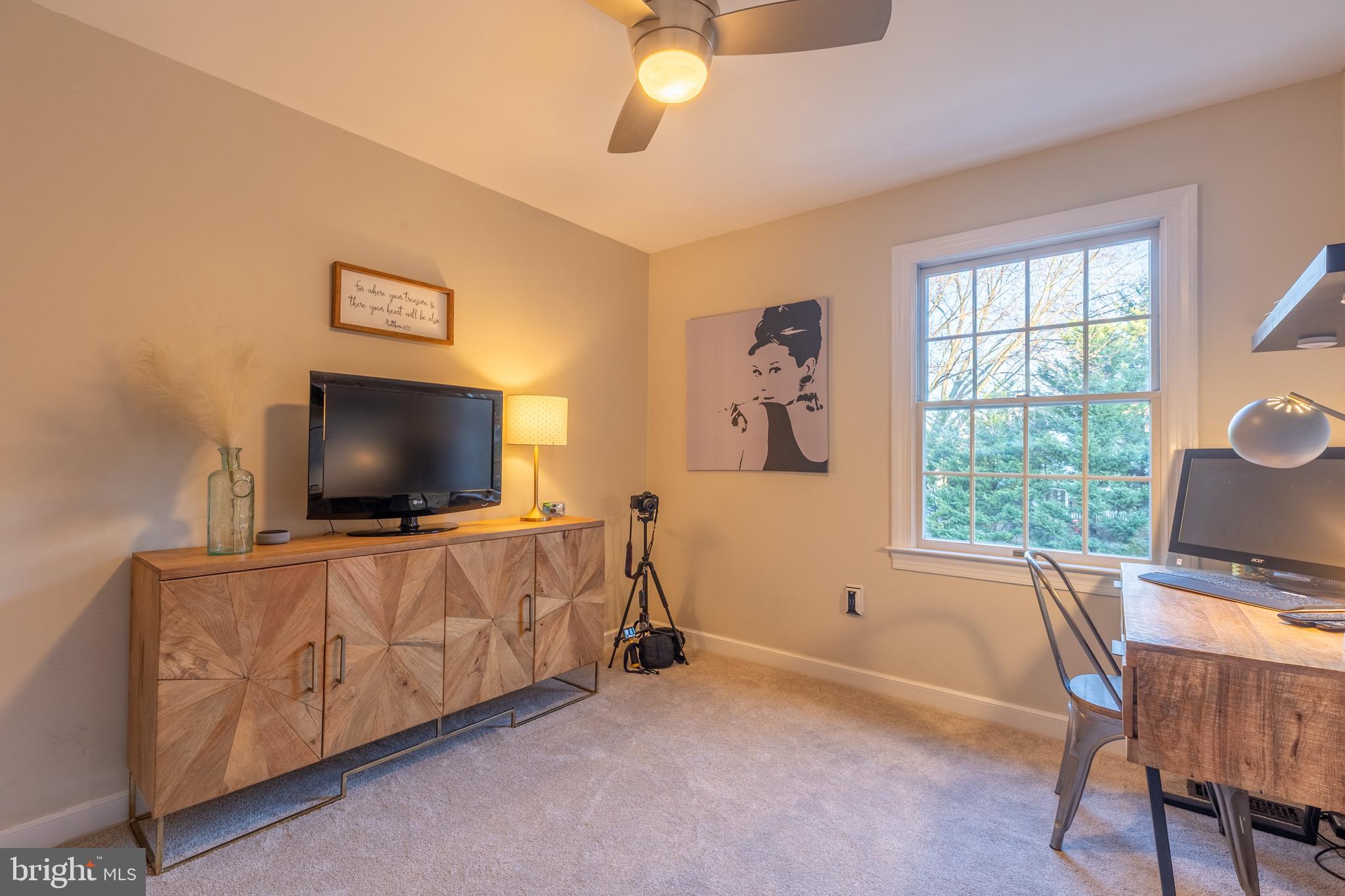 3 Heatherstone Way Hockessin, DE 19707 - Photo 18 of 29 a living room with furniture and a flat screen tv