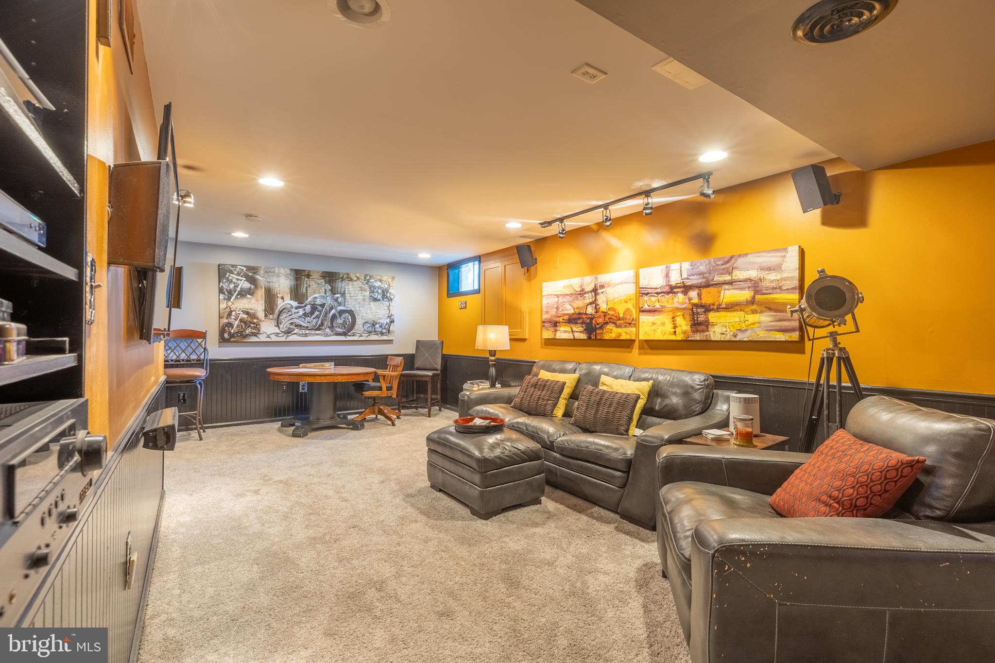 3 Heatherstone Way Hockessin, DE 19707 - Photo 20 of 29 a living room with furniture and a flat screen tv