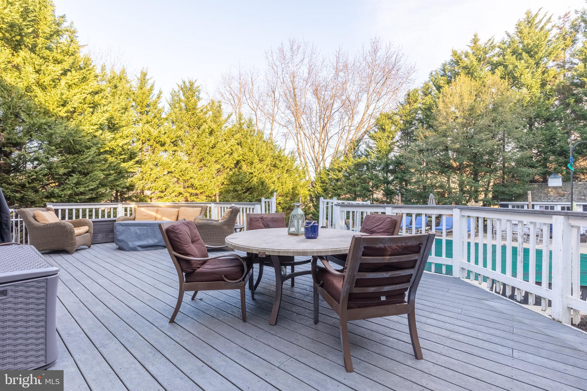 3 Heatherstone Way Hockessin, DE 19707 - Photo 25 of 29 a view of a deck patio and outdoor seating