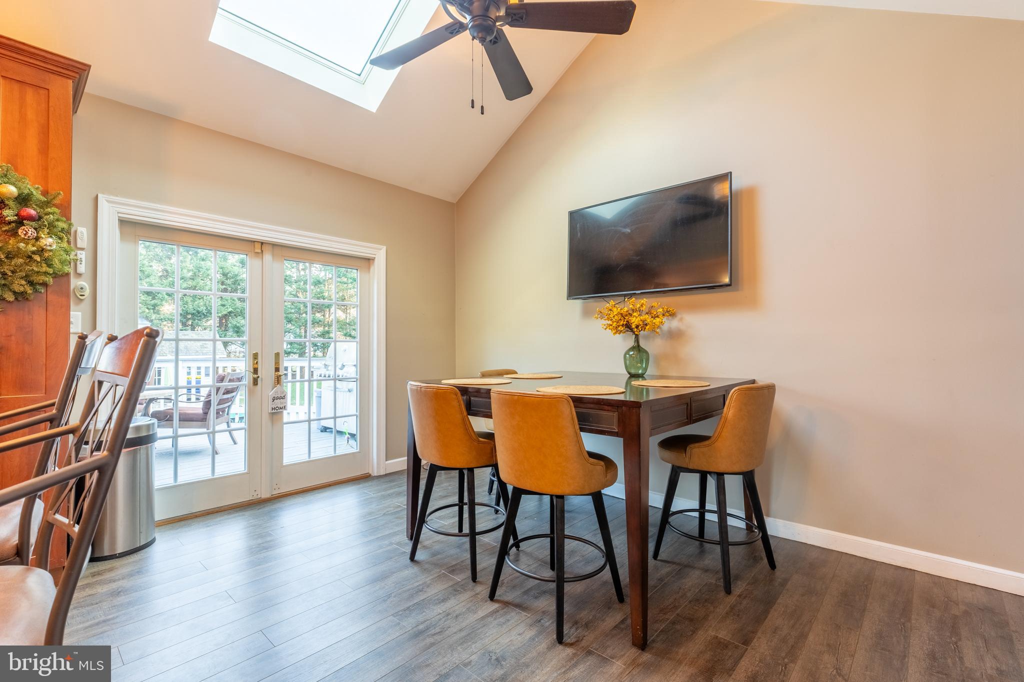 3 Heatherstone Way Hockessin, DE 19707 - Photo 8 of 29 a view of a dining room with furniture window and wooden floor