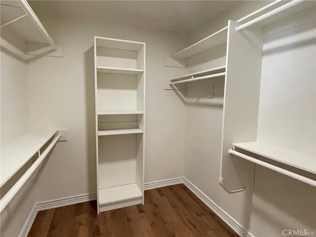 a view of an empty walk in closet