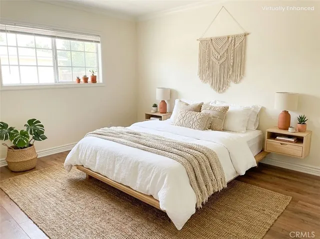 a bedroom with bed and window