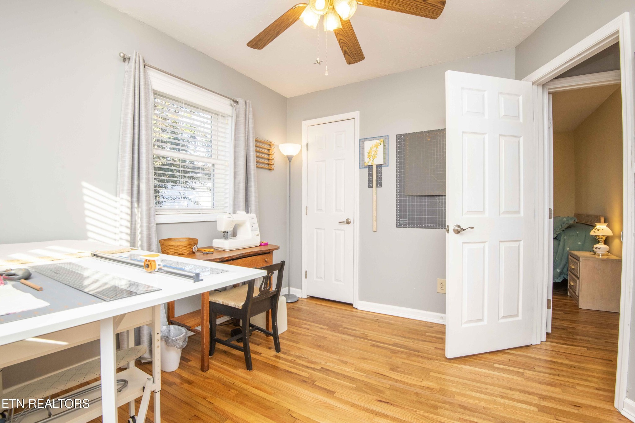 651 Hines Valley Road Lenoir City, TN 37771 - Photo 27 of 44 a view of a dining room with furniture and wooden floor
