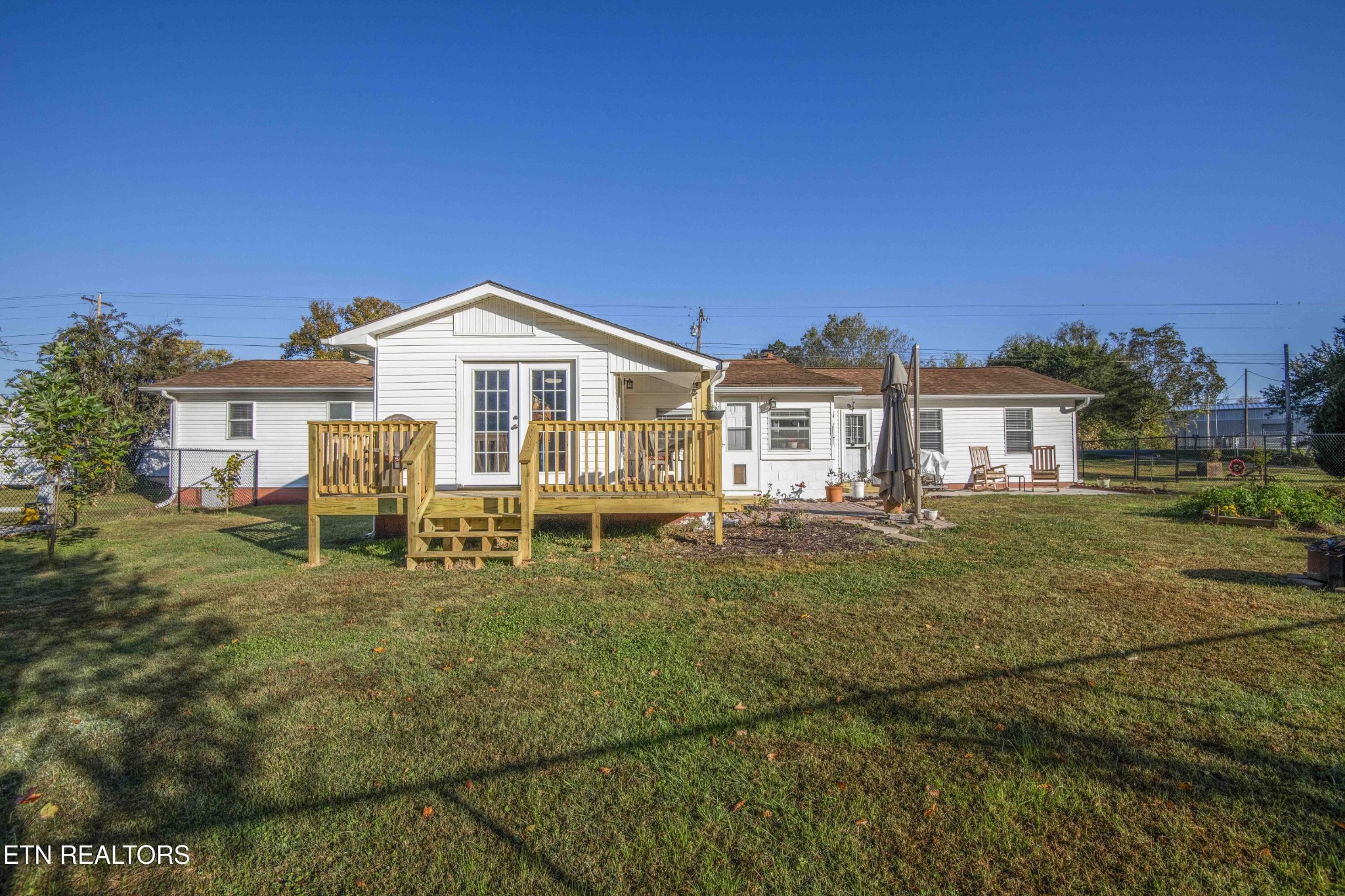651 Hines Valley Road Lenoir City, TN 37771 - Photo 30 of 44 a front view of a house with a garden