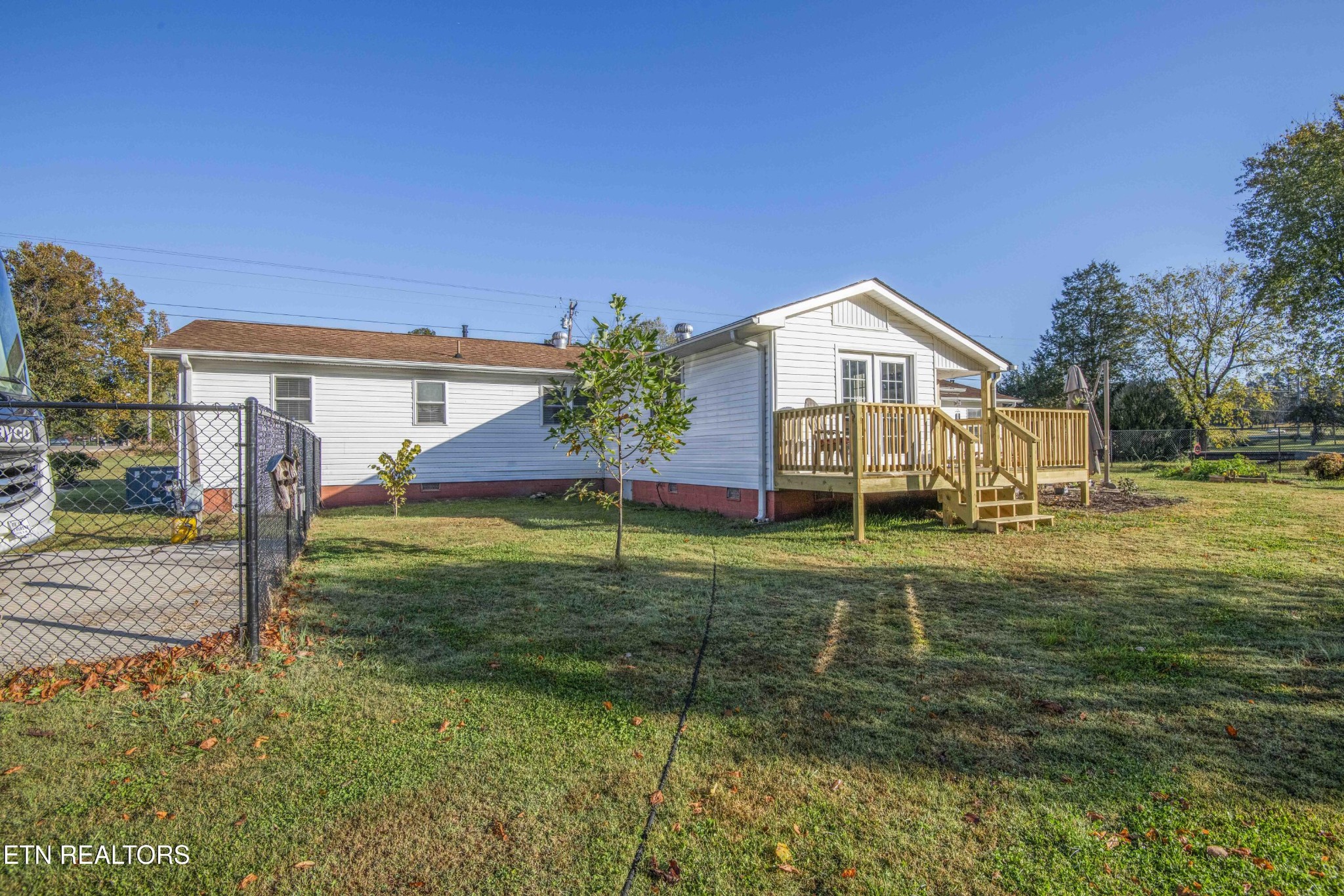 651 Hines Valley Road Lenoir City, TN 37771 - Photo 33 of 44 a front view of a house with a yard