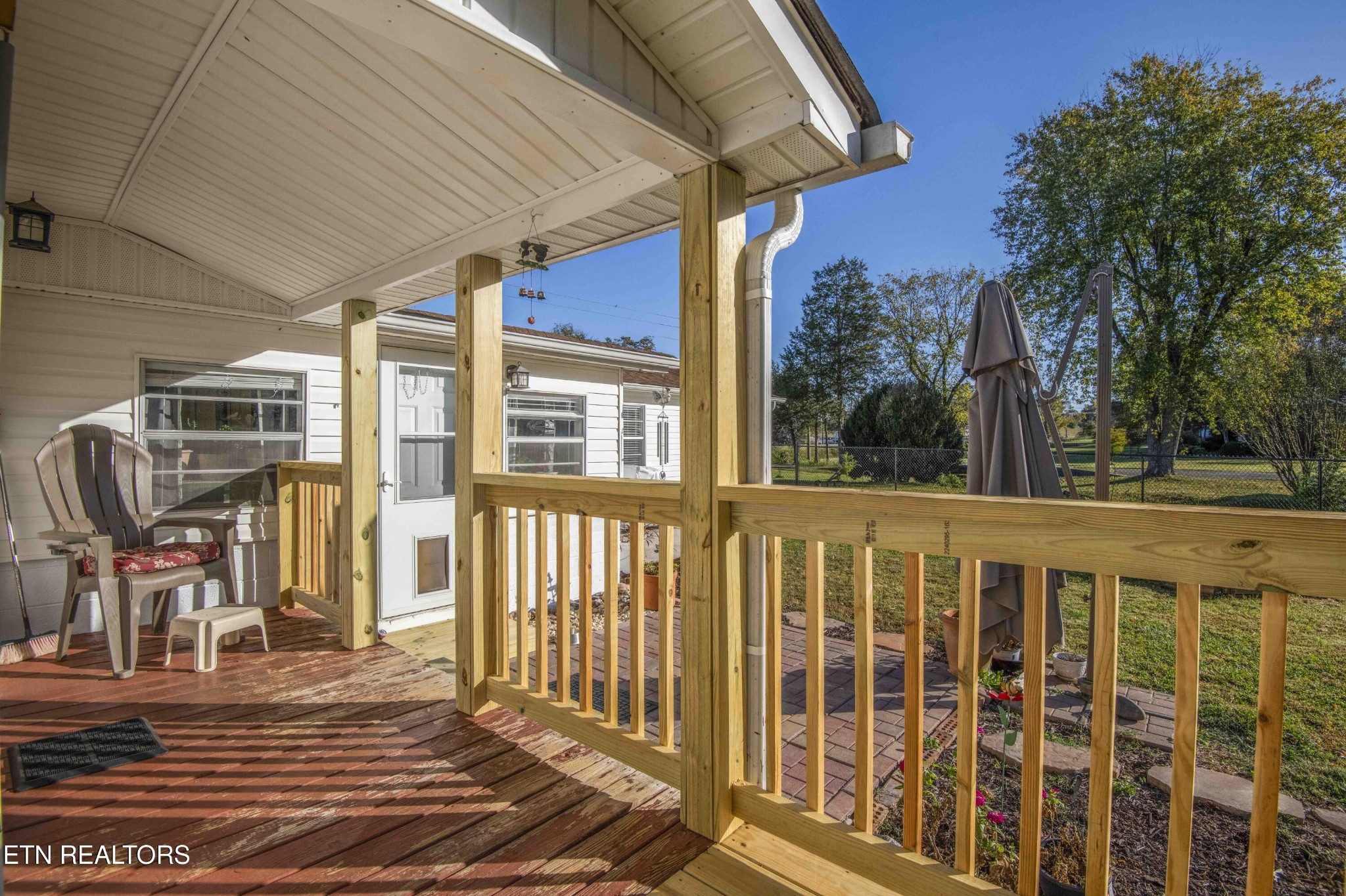 651 Hines Valley Road Lenoir City, TN 37771 - Photo 34 of 44 a view of a house with a porch