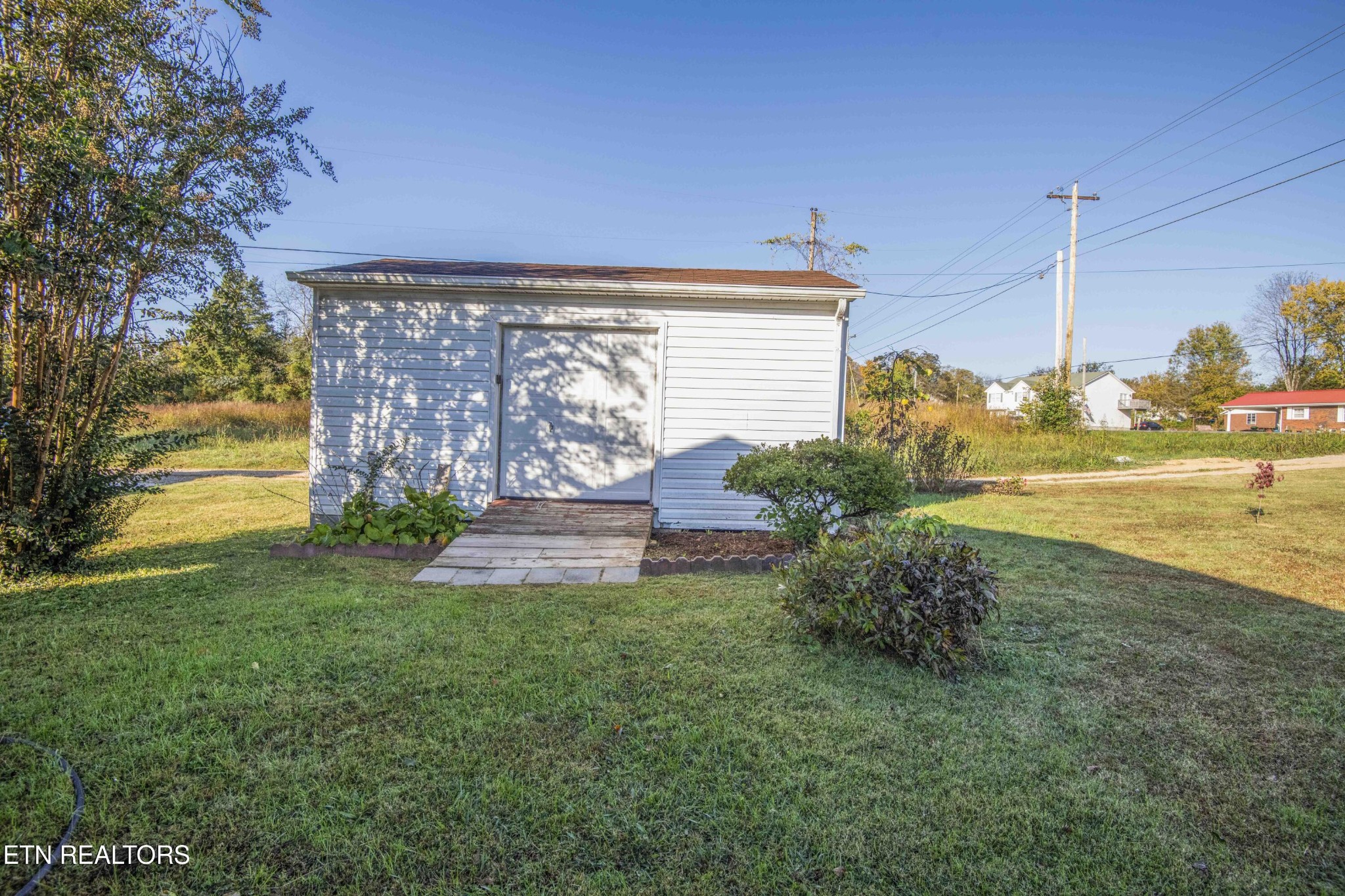 651 Hines Valley Road Lenoir City, TN 37771 - Photo 39 of 44 a view of a garden with an outdoor space