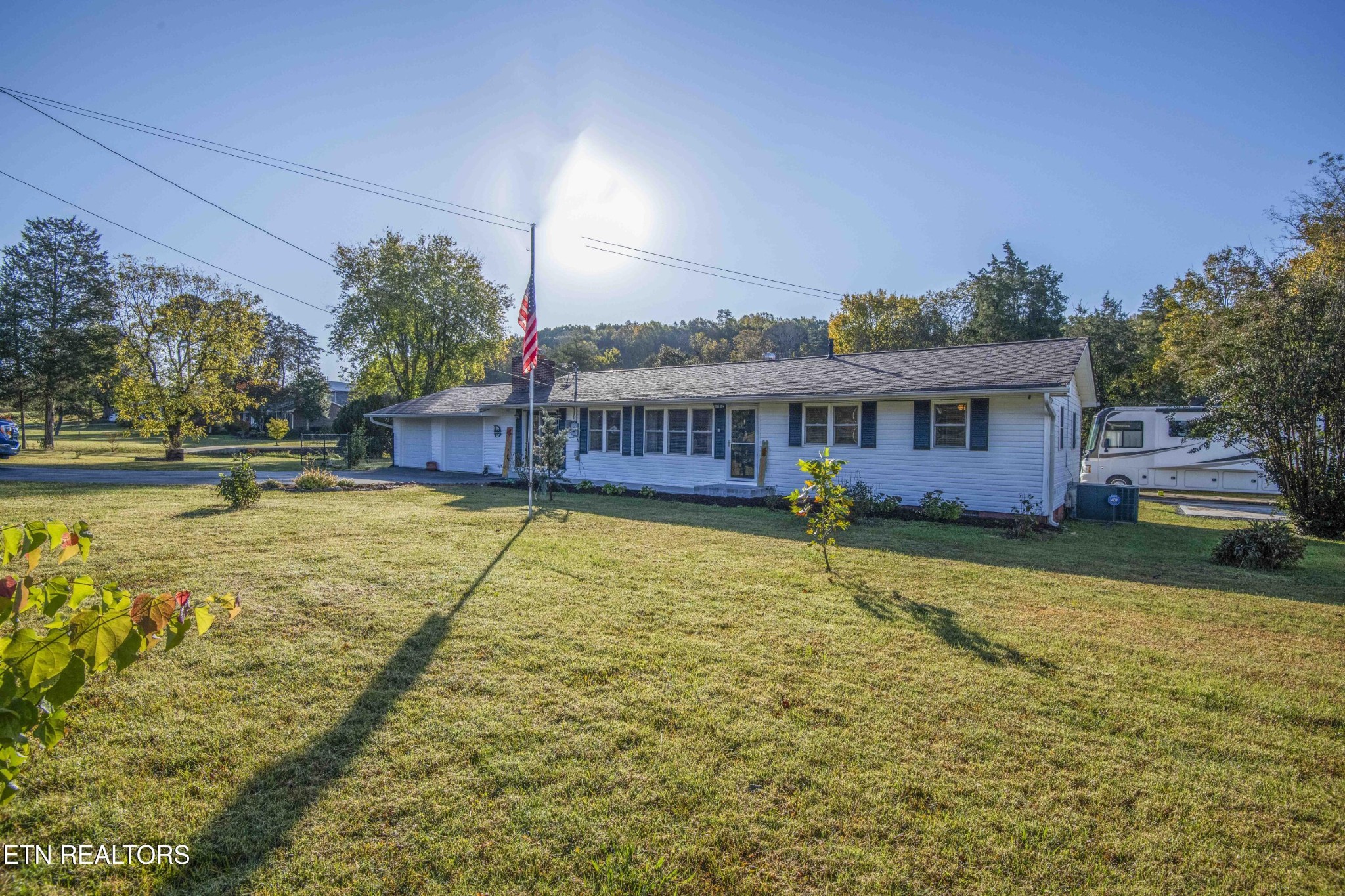 651 Hines Valley Road Lenoir City, TN 37771 - Photo 44 of 44 a view of a house with a swimming pool