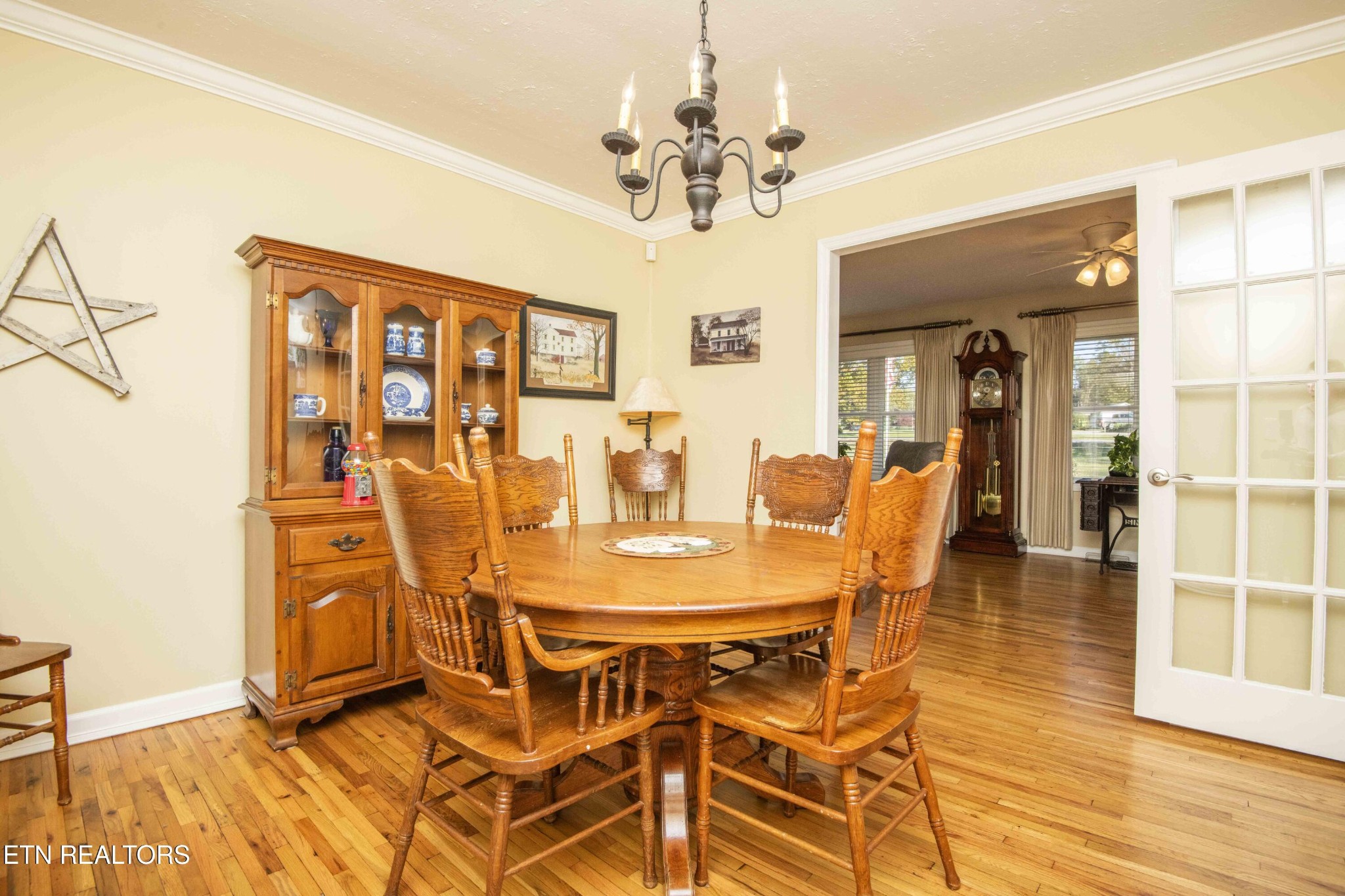 651 Hines Valley Road Lenoir City, TN 37771 - Photo 10 of 44 a view of a dining room with furniture and wooden floor