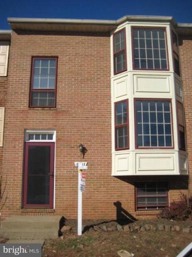 8607 Terrace View Court Manassas, VA 20110 - Photo 1 of 1 a front view of a house with a yard