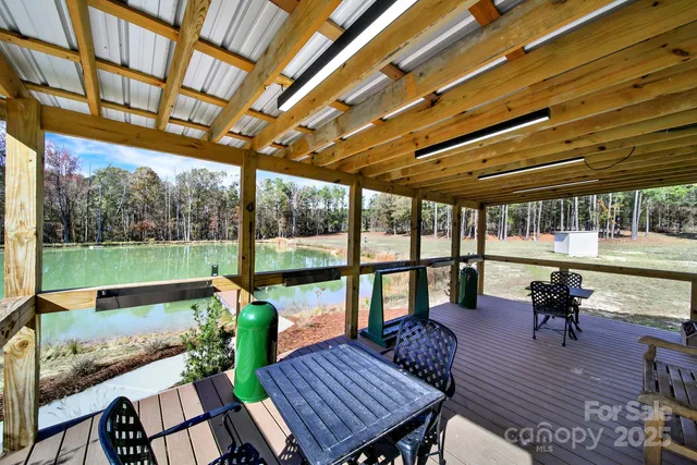 a view of a patio with wooden floor
