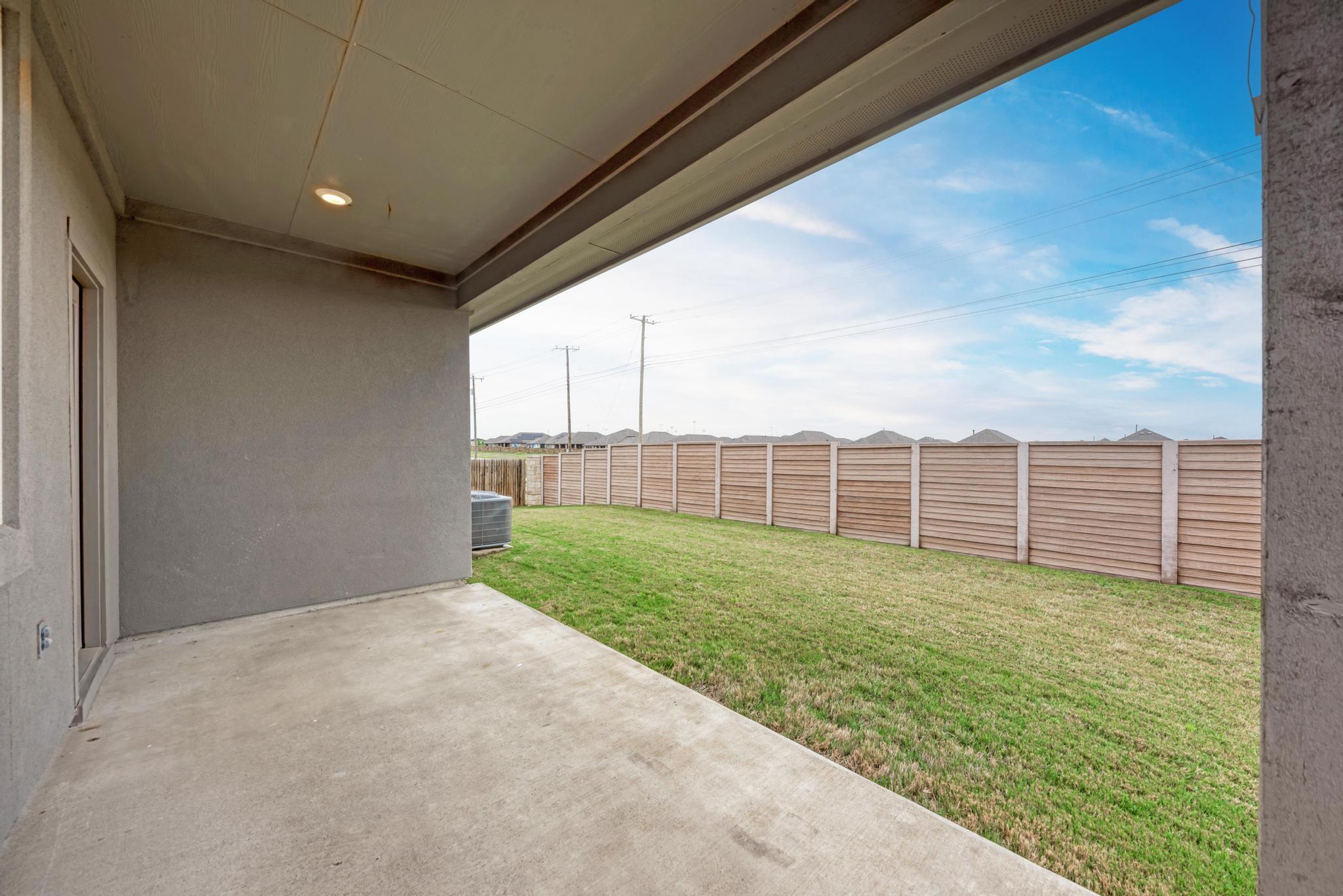 208 Abby Road Georgetown, TX 78626 - Photo 36 of 40 a view of a backyard with fence