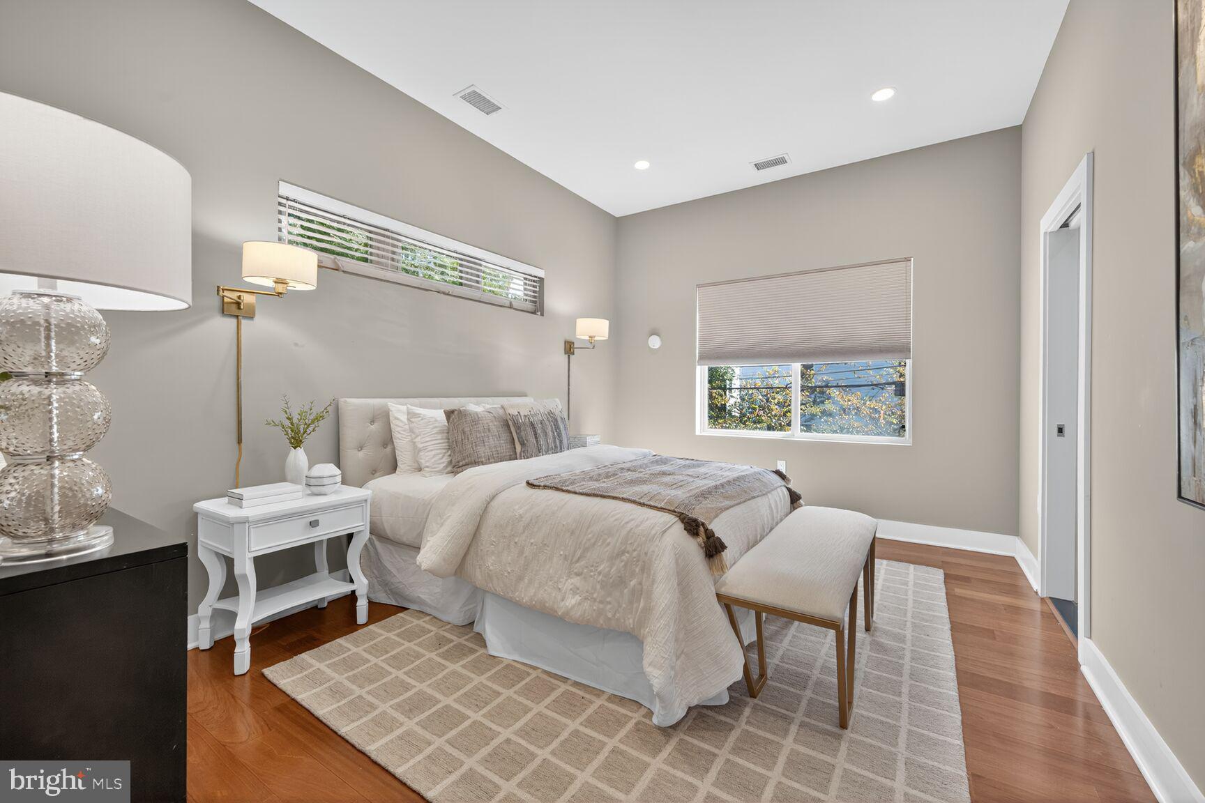 762 Park Road Northwest, Unit 7 Washington, DC 20010 - Photo 12 of 33 a bedroom with a bed and a window