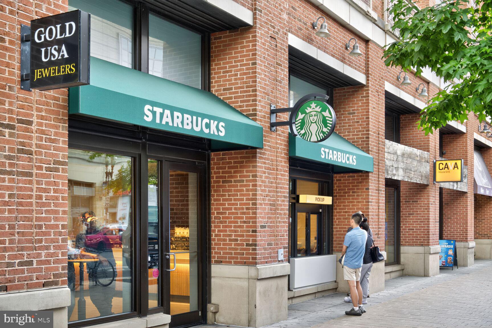 762 Park Road Northwest, Unit 7 Washington, DC 20010 - Photo 26 of 33 a front view of a building with retail shops