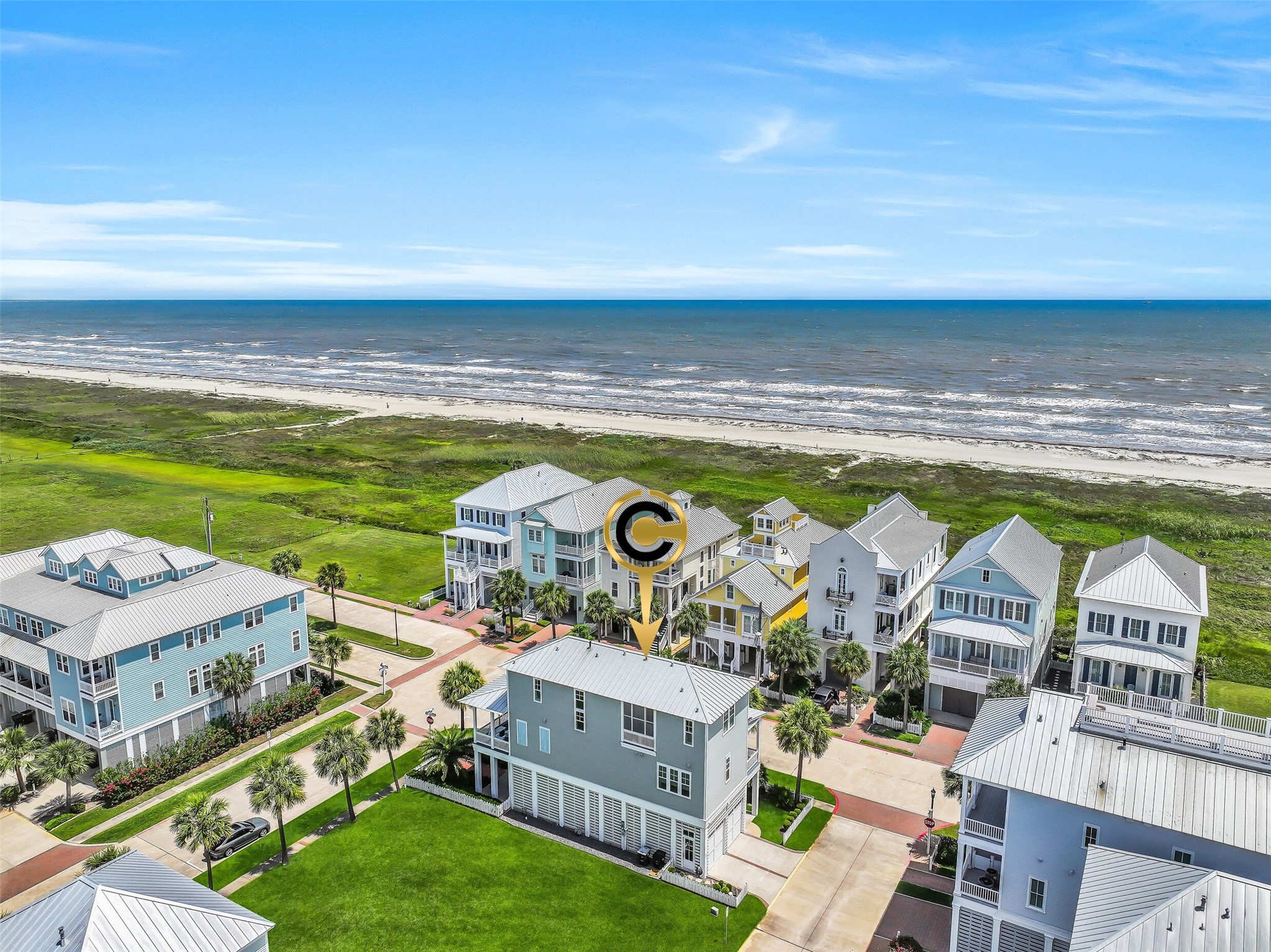 817 Positano Road Galveston, TX 77550 - Photo 49 of 50 Perfectly positioned near the shoreline, this aerial view highlights the home's exceptional location just moments from the beach. Coastal beauty surrounds you from every direction.
