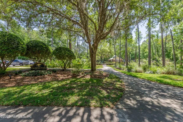 a view of outdoor space with deck and yard