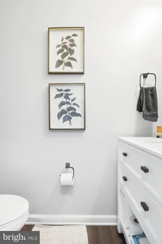 a bathroom with a toilet and a sink
