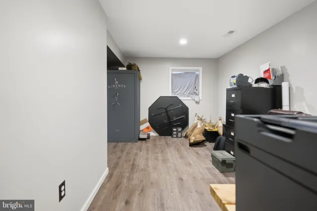 a front view of house with yard and swimming pool