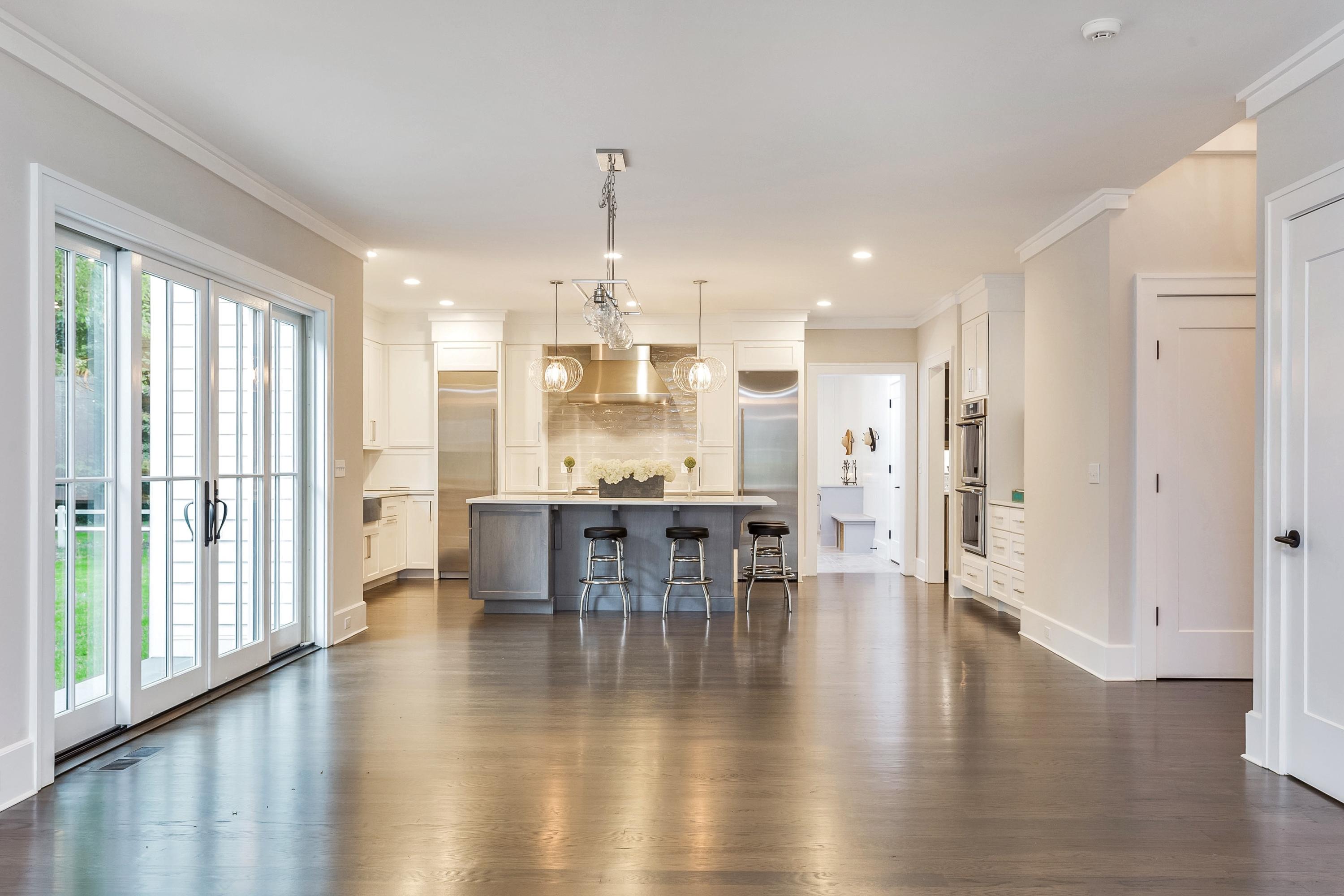 11 Rocaton Road Darien, CT 06820 - Photo 12 of 38 an open kitchen with a table and chairs
