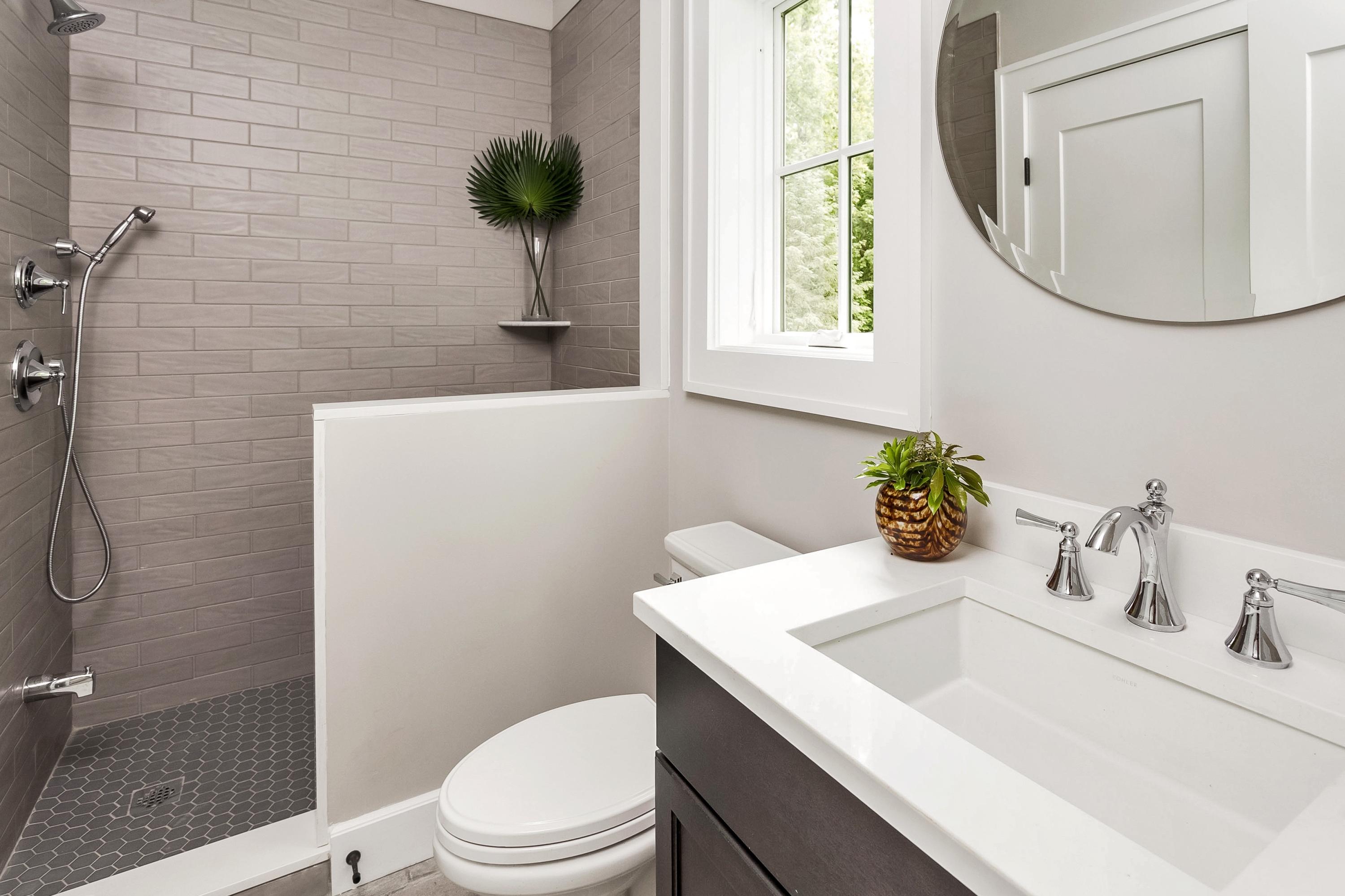 11 Rocaton Road Darien, CT 06820 - Photo 16 of 38 a bathroom with a sink toilet and a mirror