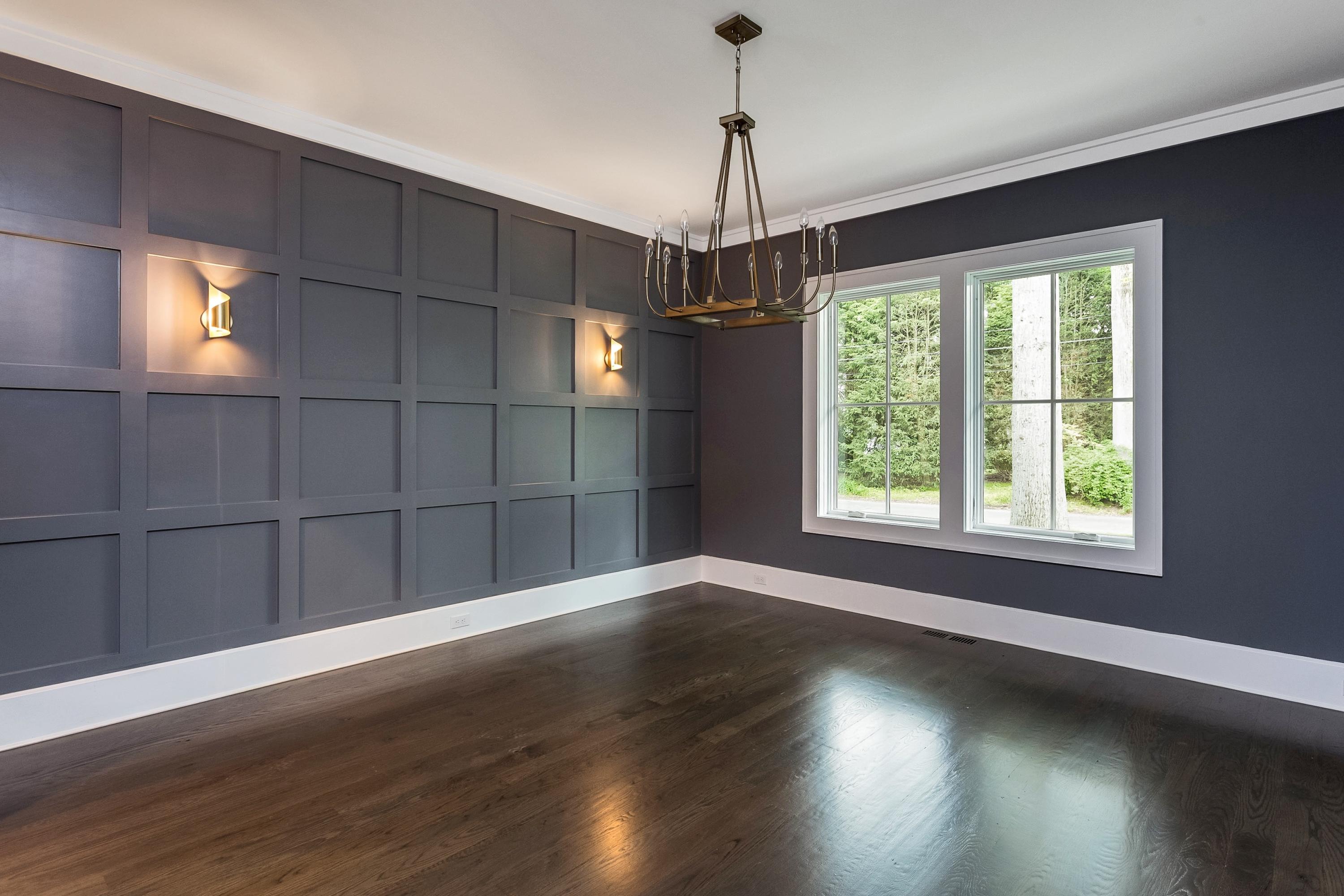 11 Rocaton Road Darien, CT 06820 - Photo 18 of 38 a view of a room with wooden floor chandeliers and a window