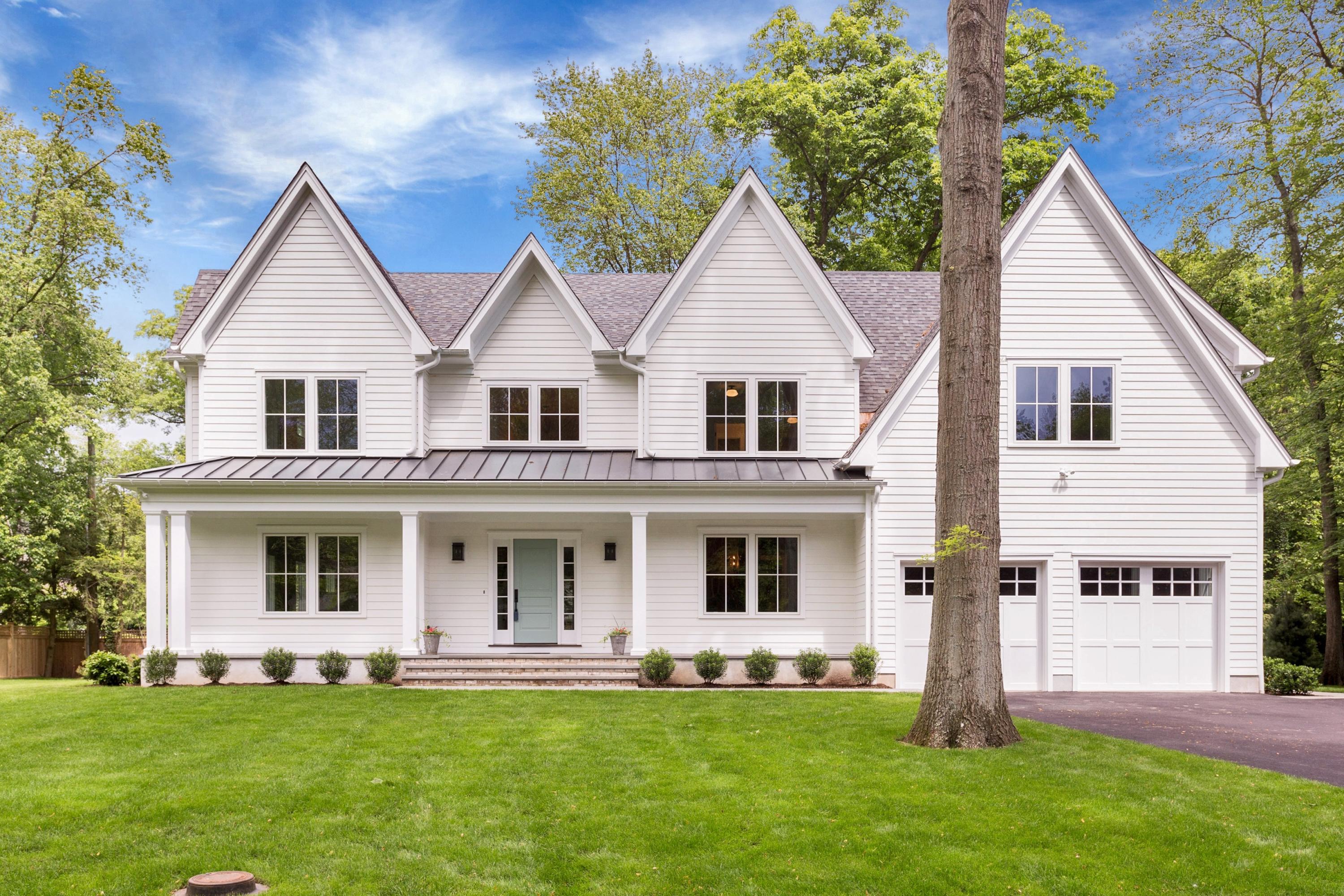 11 Rocaton Road Darien, CT 06820 - Photo 2 of 38 a front view of a house with a yard