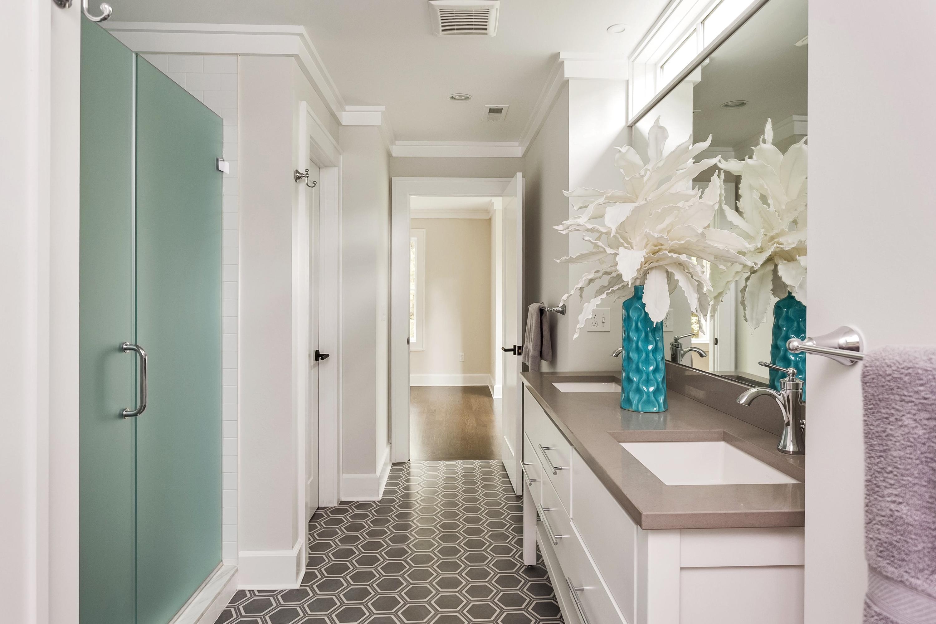 11 Rocaton Road Darien, CT 06820 - Photo 25 of 38 a bathroom with a sink and a mirror