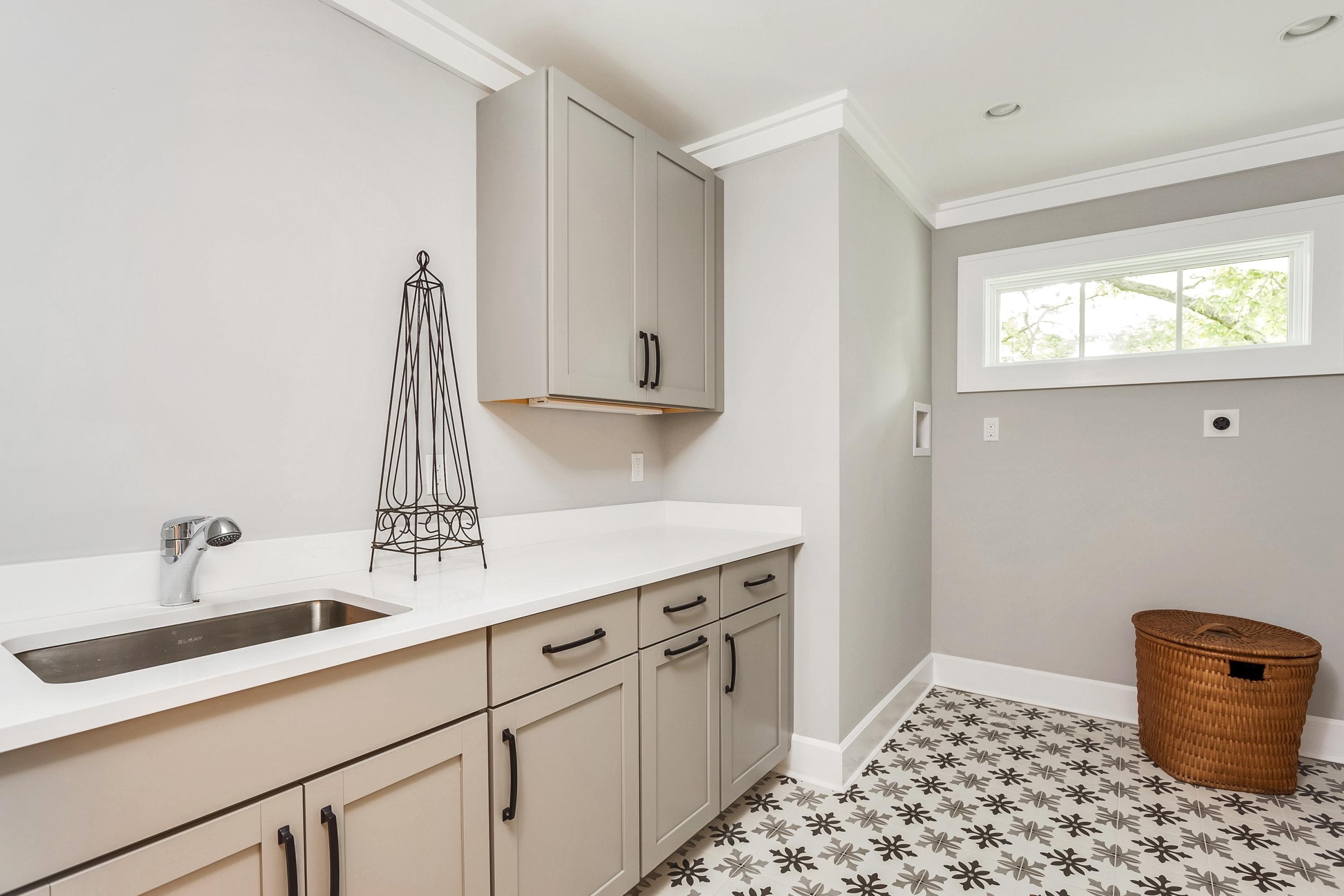 11 Rocaton Road Darien, CT 06820 - Photo 26 of 38 a kitchen with a sink and cabinets