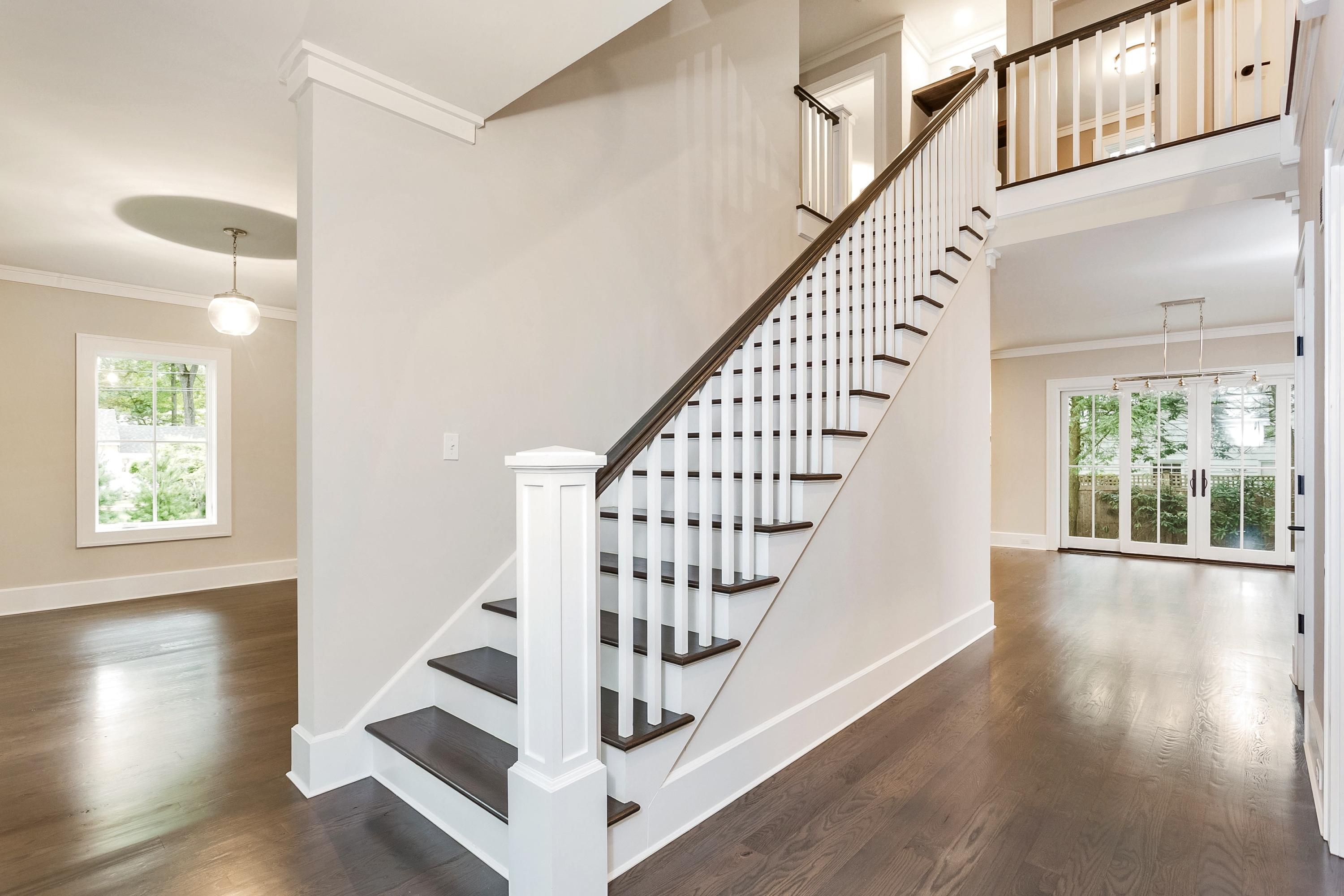 11 Rocaton Road Darien, CT 06820 - Photo 4 of 38 a view of entryway with wooden floor and front door