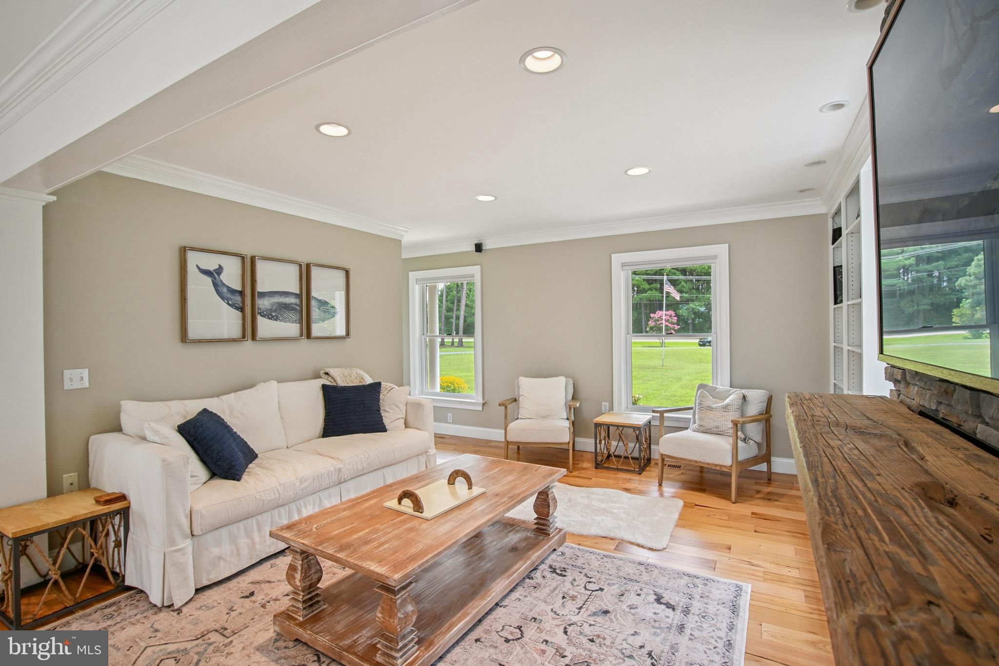 6670 Tilghman Island Road Sherwood, MD 21665 - Photo 24 of 64 a living room with furniture and a large window