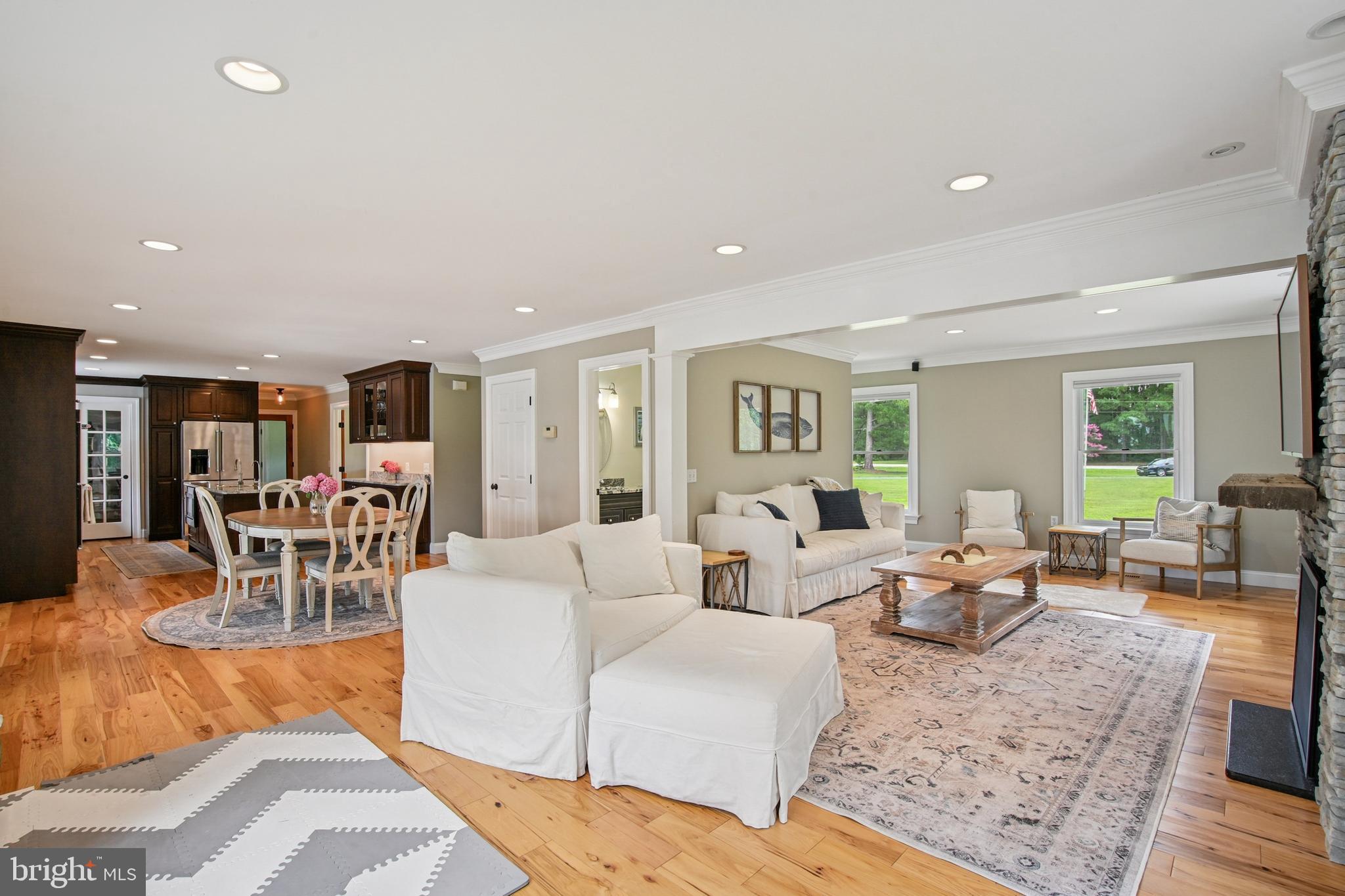 6670 Tilghman Island Road Sherwood, MD 21665 - Photo 25 of 64 a living room with furniture and wooden floor