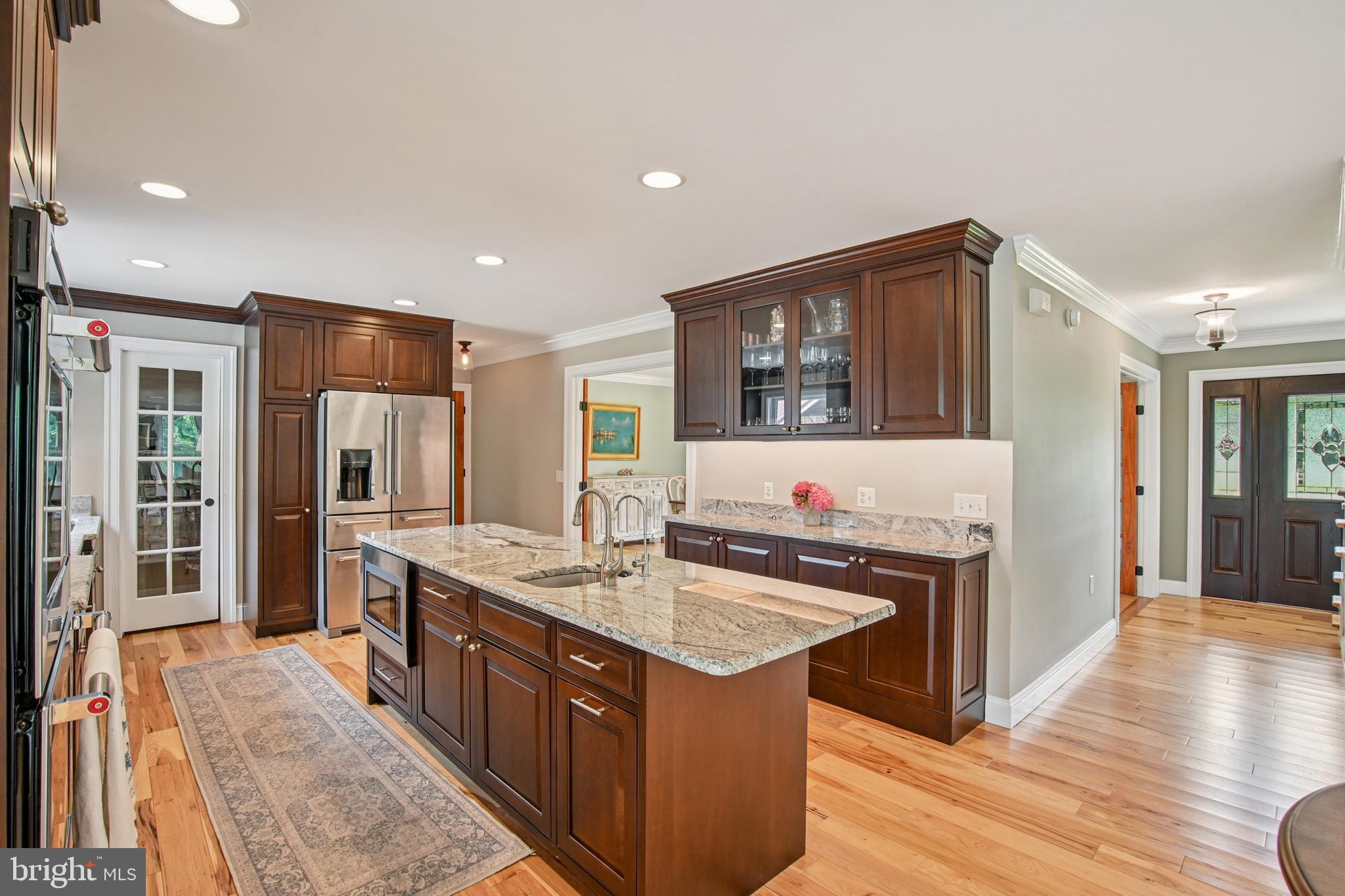 6670 Tilghman Island Road Sherwood, MD 21665 - Photo 32 of 64 a kitchen with stainless steel appliances granite countertop a stove and a sink