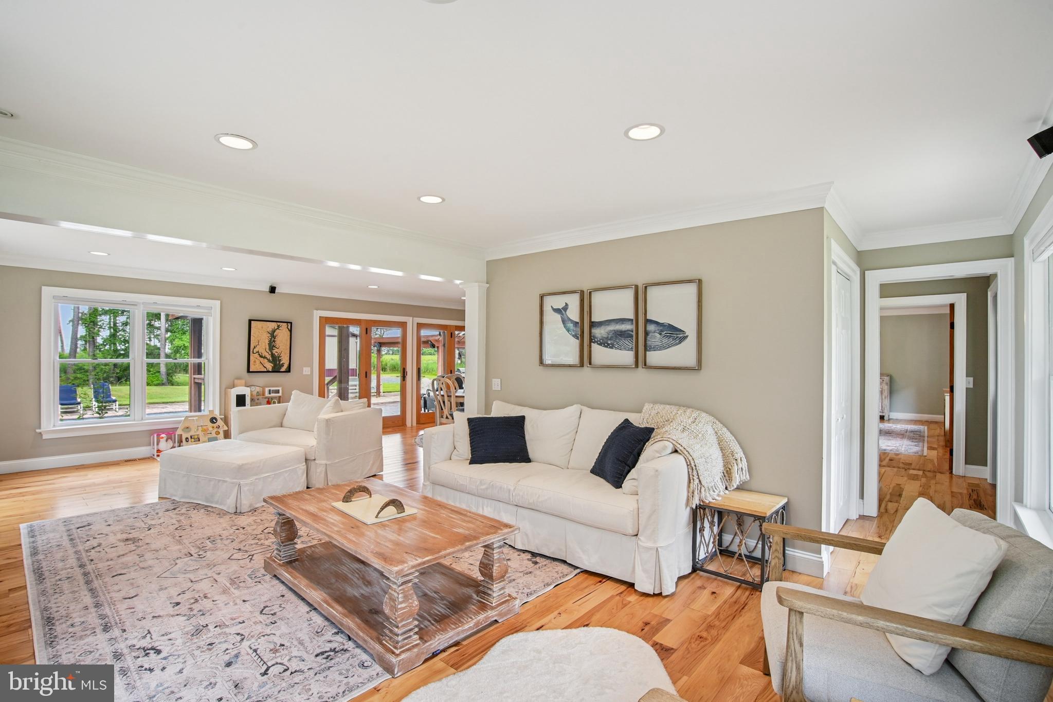 6670 Tilghman Island Road Sherwood, MD 21665 - Photo 39 of 64 a living room with furniture and a large window