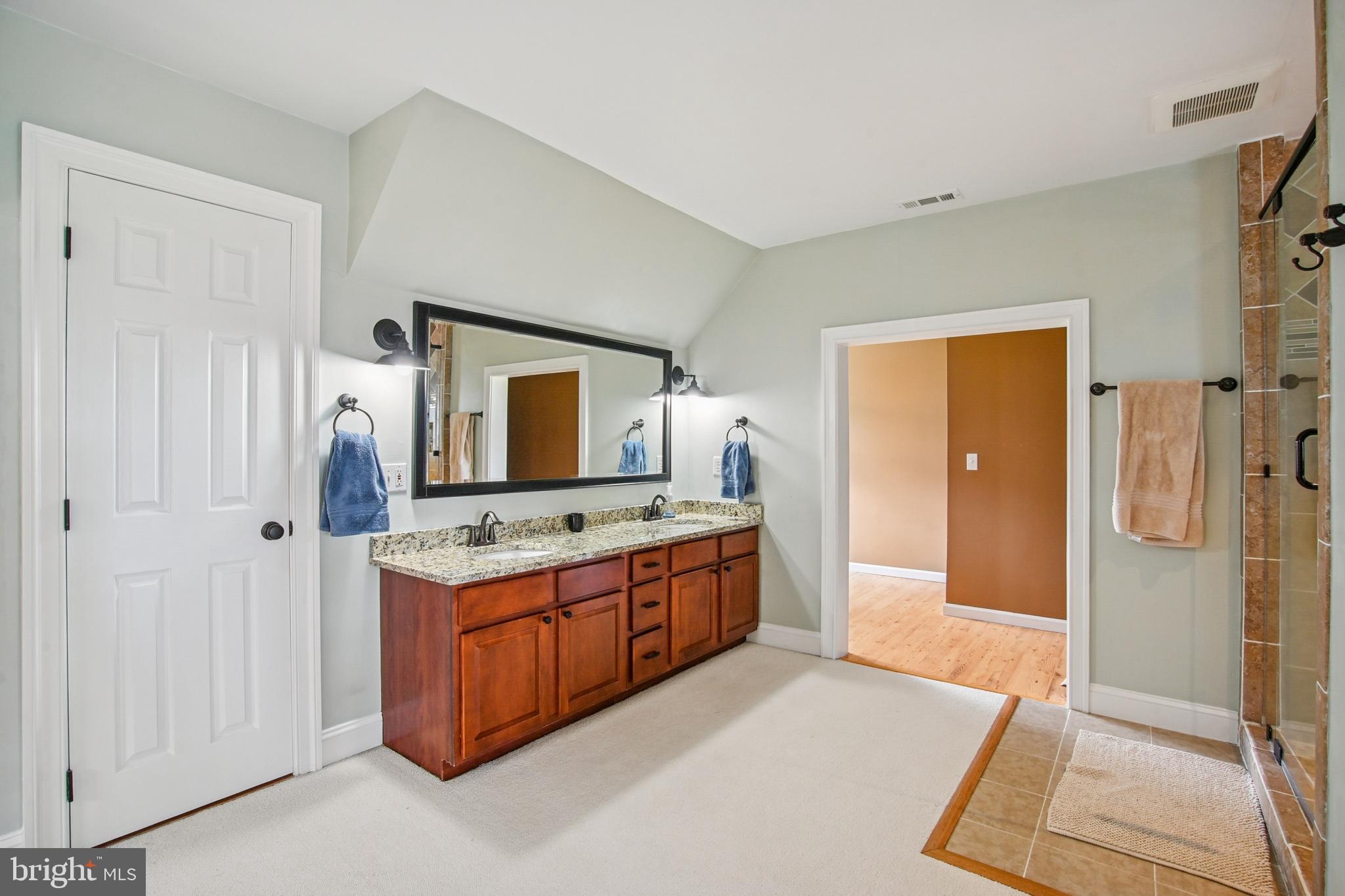 6670 Tilghman Island Road Sherwood, MD 21665 - Photo 48 of 64 a kitchen with stainless steel appliances granite countertop a refrigerator and a stove