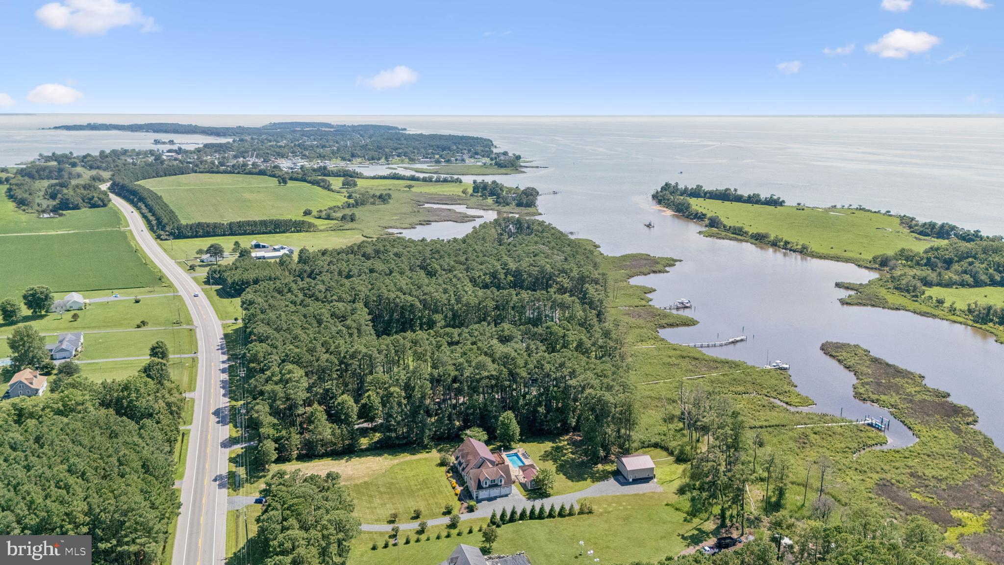 6670 Tilghman Island Road Sherwood, MD 21665 - Photo 8 of 64 an aerial view of a houses with a lake view