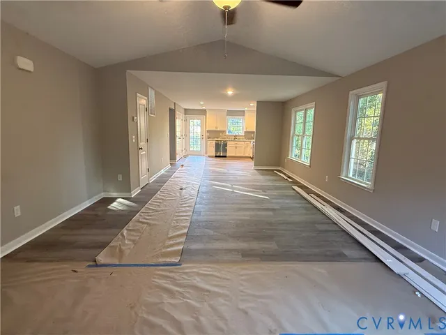 a view of a hallway with windows