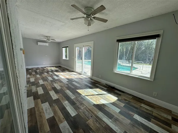 a view of an empty room and window