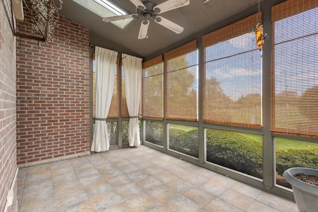 a view of a room with a large window