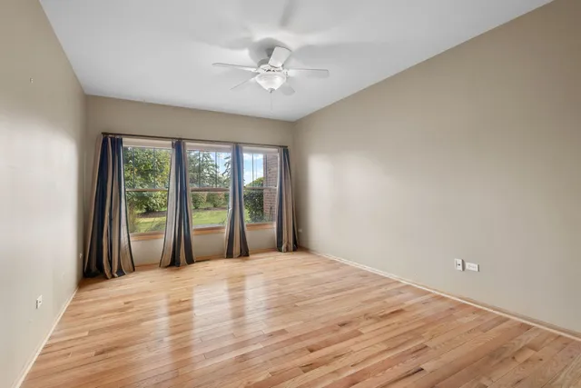 a view of a room with a large window