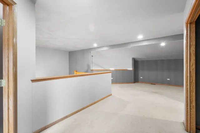 a bathroom with a sink a mirror and a shower