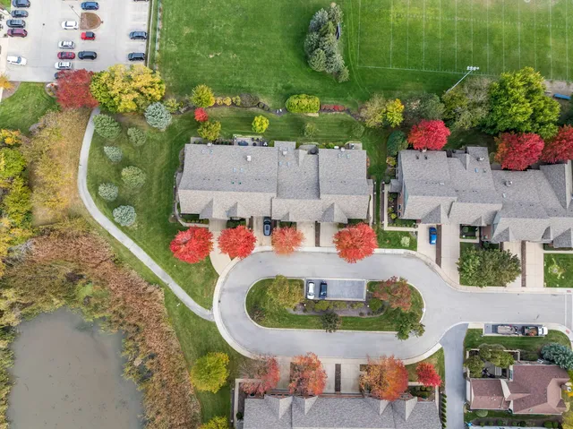 an aerial view of residential house with outdoor space