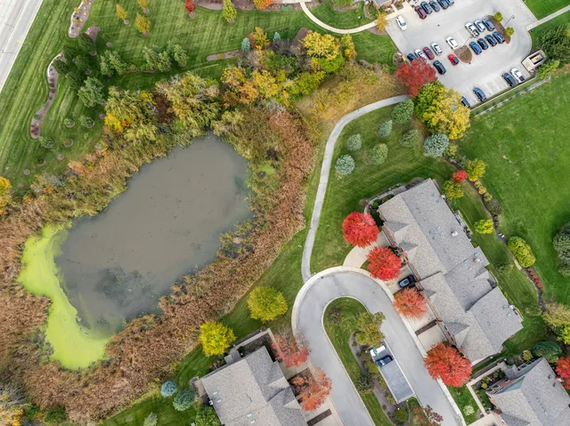 a picture of a room with a cabinet and a refrigerator