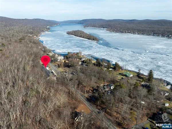 a view of a mountain with a lake